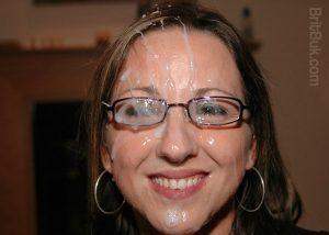 Carly Cumslut showing her facial cum mask.
